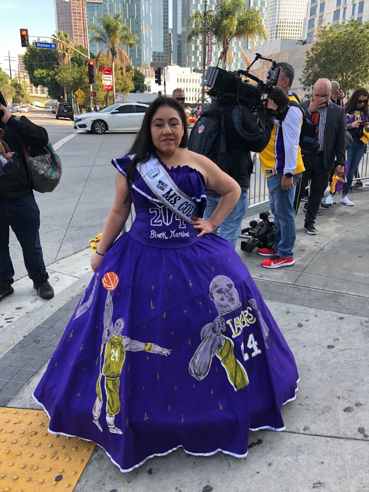 Franchesca Flores, 43, of Littleton, Colo., arrived outside Staples Center in a hand-painted purple ball gown with images of Kobe and Gianna Bryant shooting hoops.
