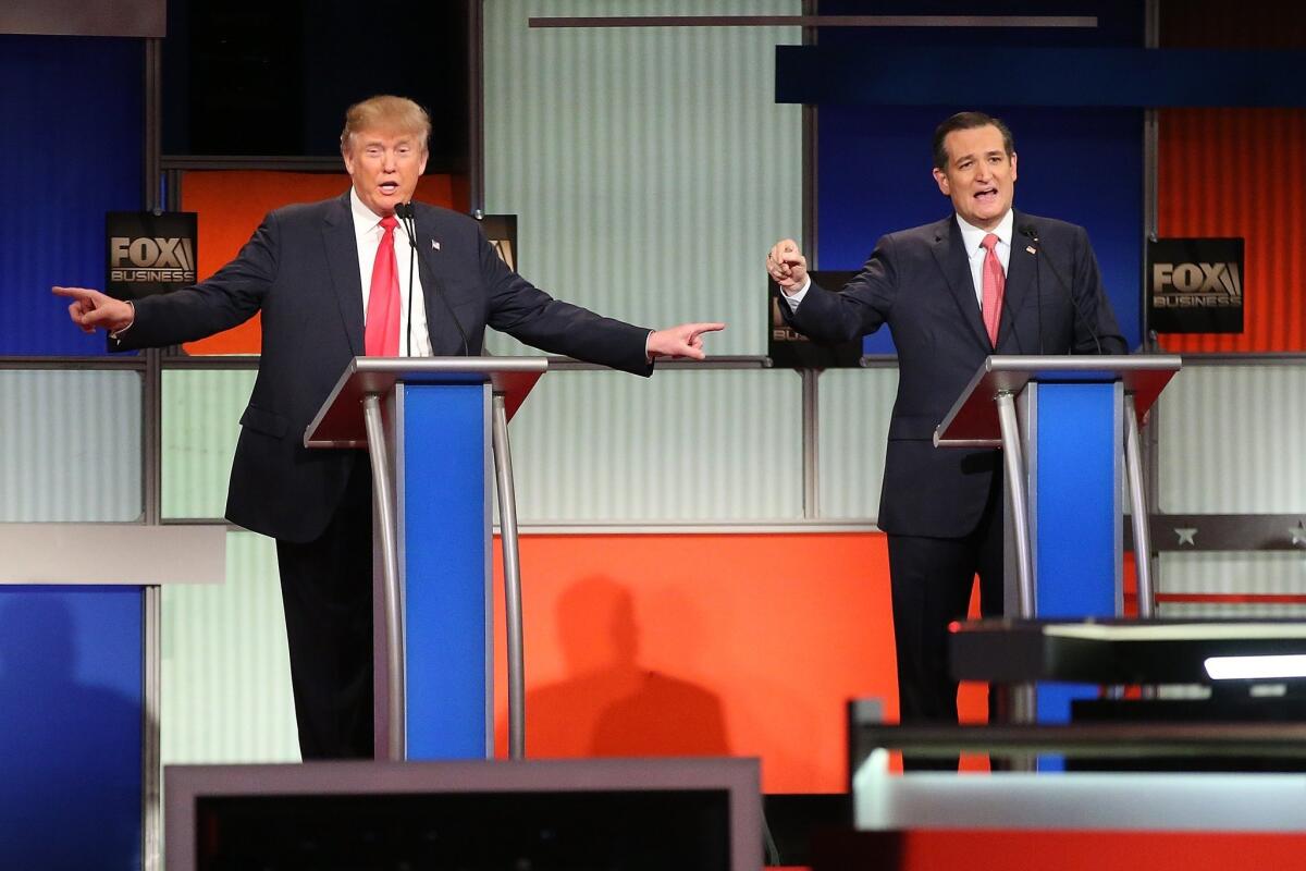 Republican presidential candidates Donald Trump, left, and Sen. Ted Cruz of Texas at the primary debate held in South Carolina and shown on Fox Business Network.