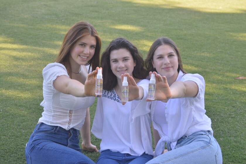 The Slosar sisters behind Sunshine Body Products: Natalie, Avery and Kelly.