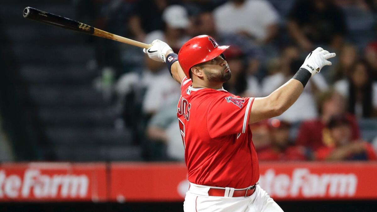 Angels' Albert Pujols has driven in 79 of the 361 base runners who stood aboard while he batted.
