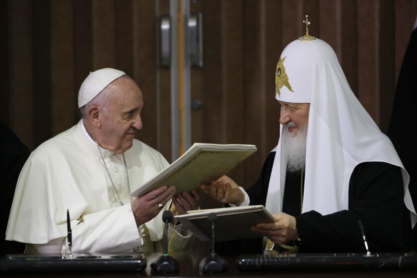 FILE - Pope Francis, left, and Russian Orthodox Patriarch Kirill exchange a joint declaration on religious unity in Havana, Cuba on Feb. 12, 2016. The head of the Polish bishops’ conference had done what Pope Francis has so far avoided doing by publicly condemning Russia’s invasion of Ukraine. Archbishop Stanislaw Gadecki also publicly urged the head of the Russian Orthodox Church to use his influence on Vladimir Putin to demand an end to the war and for Russian soldiers to stand down. “The time will come to settle these crimes, including before the international courts," Gadecki warned in his March 2 letter to Patriarch Kirill. (AP Photo/Gregorio Borgia, Pool)