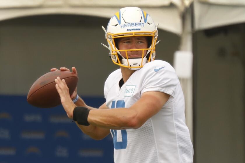 COSTA MESA, CA - AUGUST 17: Number 10 Justin Herbert, is a new quarterback for the Los Angeles Chargers football team sixth pick in the 2020 draft out of University of Oregon as the team conducts practice at the Hammett Sports Complex in Costa Mesa on Monday August 17, 2020 in preparation for the 2020 National Football League season. Orange County on Monday, Aug. 17, 2020 in Costa Mesa, CA. (Al Seib / Los Angeles Times