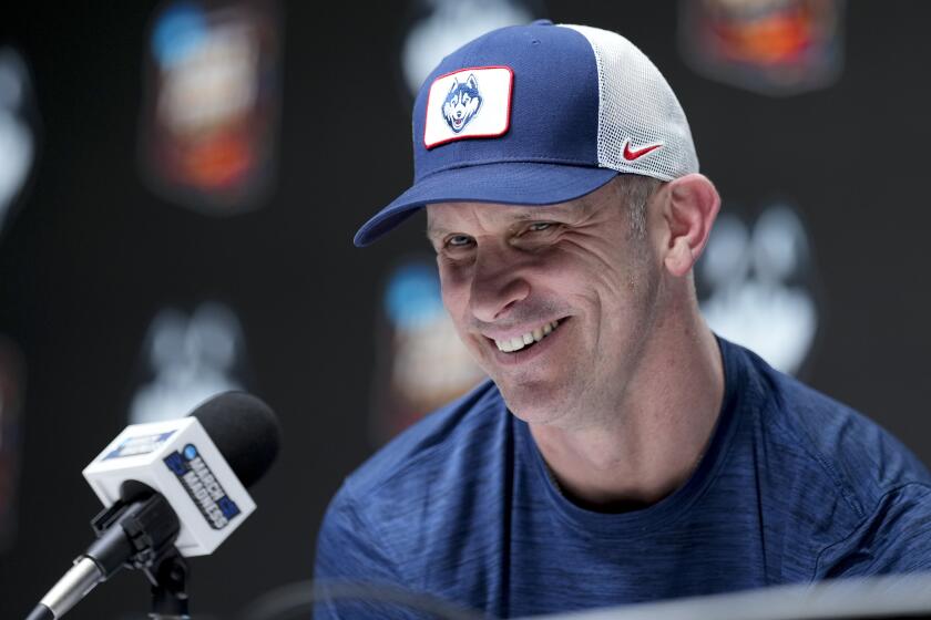 FILE - UConn head coach Dan Hurley speaks to the media during a news conference,