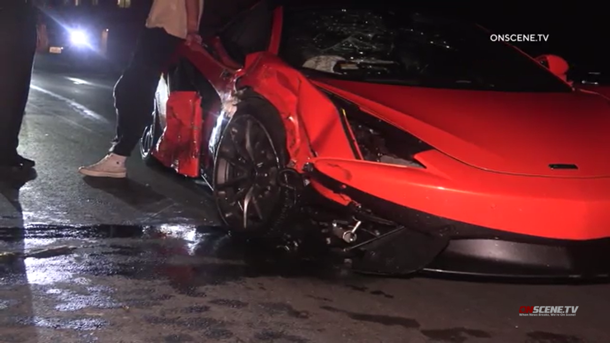 A driver was arrested on suspicion of DUI after crashing a McLaren sports car into several parked cars.