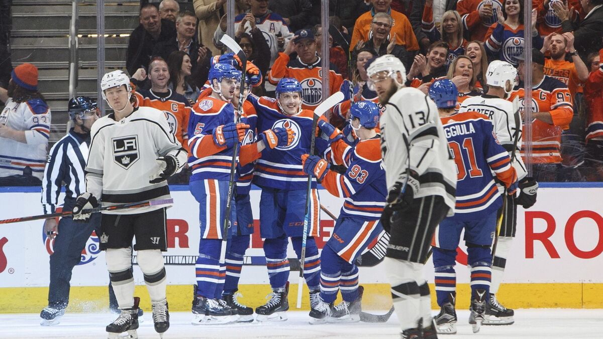 Edmonton Oilers celebrate a goal against the Kings during the first period.