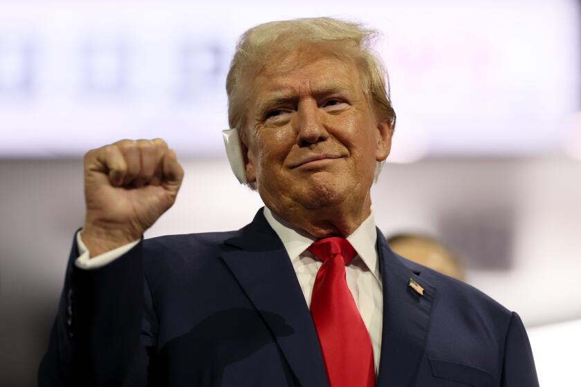 MILWAUKEE, WI JULY 15, 2024 -- Former US President Donald Trump gestures during the first day of the 2024 Republican National Convention at Milwaukee, WI on Monday, July 15, 2024. (Robert Gauthier / Los Angeles Times)