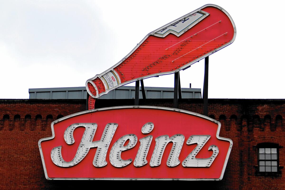 H.J. Heinz Co.'s plan to buy Kraft Foods Group Inc. was engineered by Heinz's owners, Brazilian investment firm 3G Capital and billionaire investor Warren Buffett's Berkshire Hathaway. Above, a sign at the Sen. John Heinz History Center in Pittsburgh.
