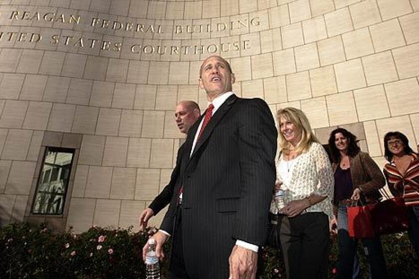 Former Orange County Sheriff Michael S. Carona leaves federal court.