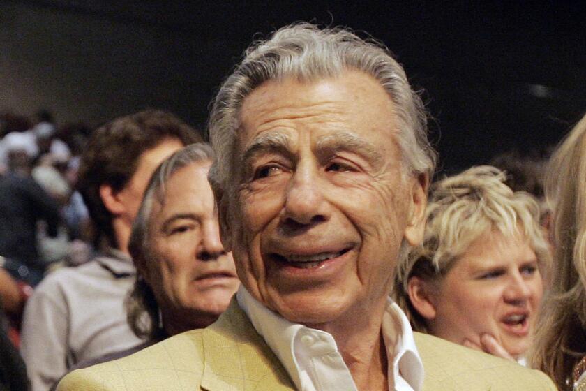 Billionaire Kirk Kerkorian is shown at the Oscar De La Hoya and Floyd Mayweather Jr. boxing match at the MGM Grand Garden Arena in Las Vegas in 2008.