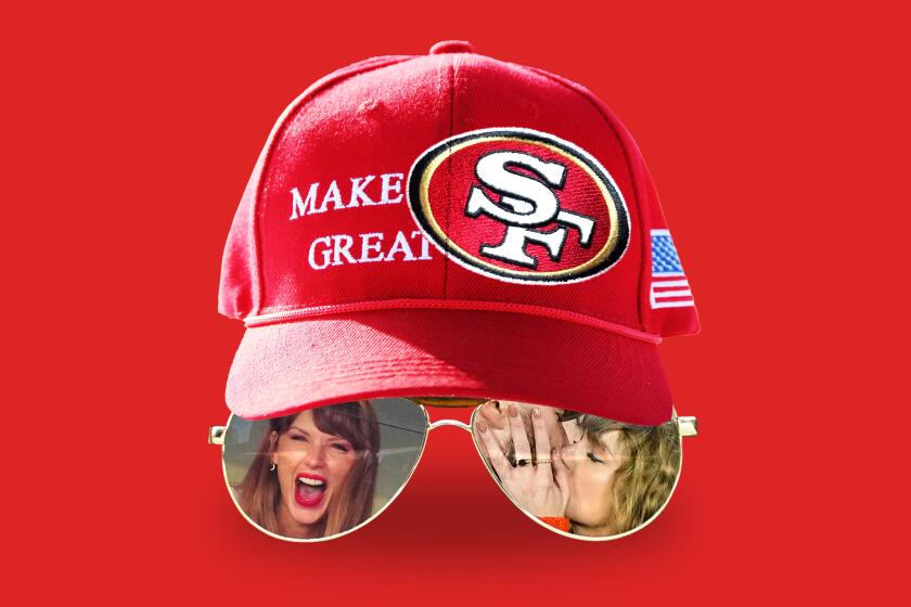A red MAGA hat with a SF Niners logo patched on it. Sunglasses under the hat show Taylor Swift mirrored in the lenses.