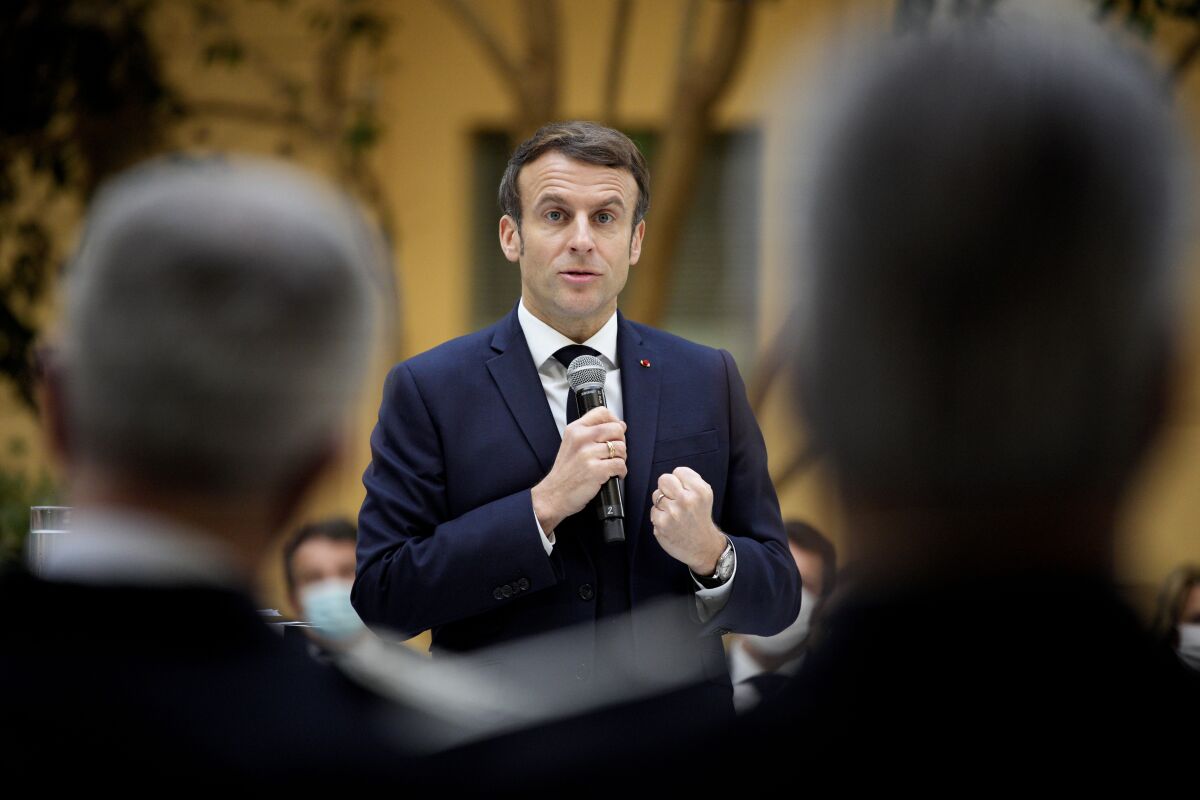 France's President Emmanuel Macron delivers a speech during a meeting with police officers in Nice, southern France, Monday, Jan. 10, 2022. President Emmanuel Macron traveled to the French Mediterranean coast on Monday to talk about internal security, making a pit stop in the city where an extremist drove a cargo truck into Bastille Day crowds in 2016, killing 86 people and injuring hundreds more. (AP Photo/Daniel Cole, Pool)