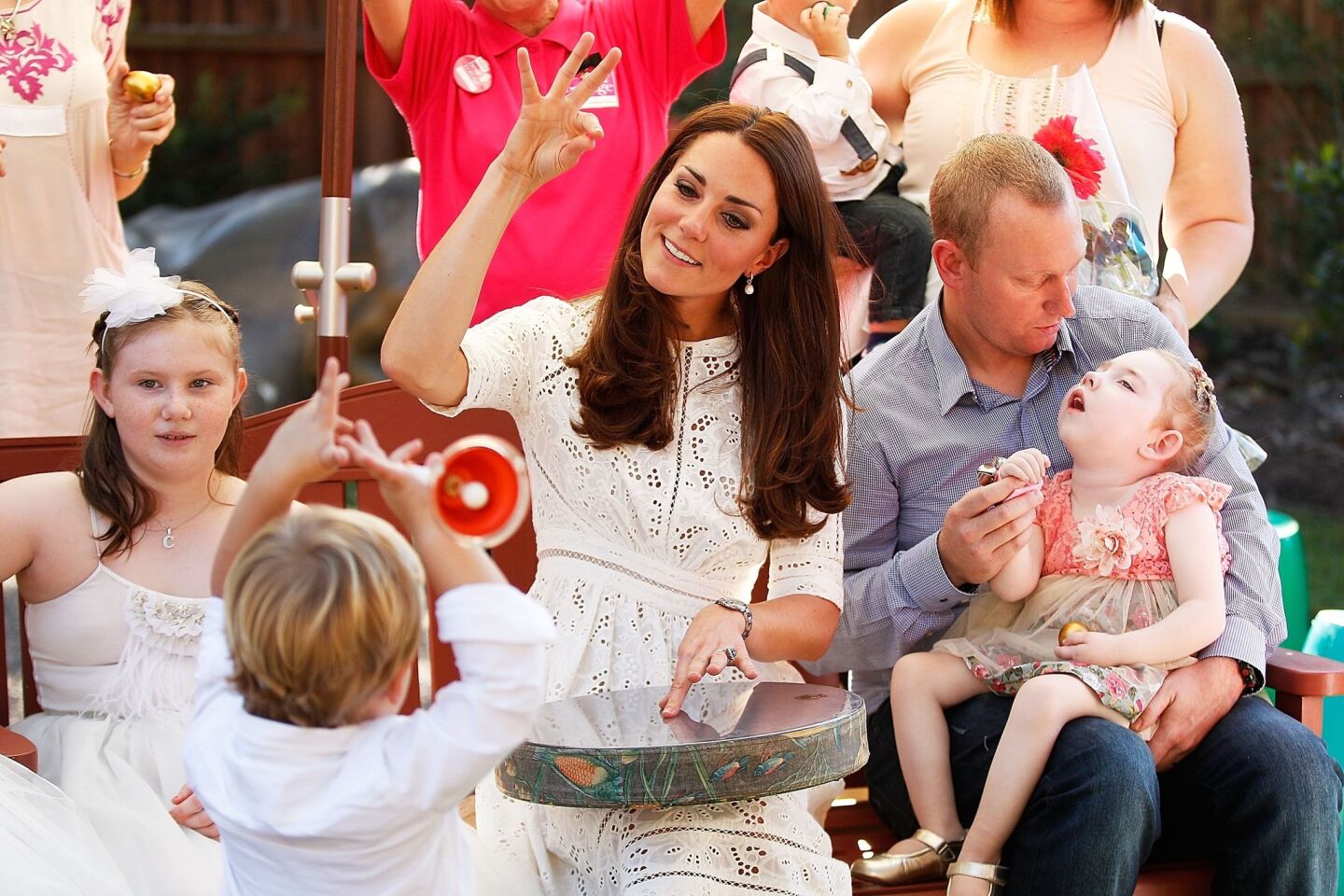 Catherine, duchess of Cambridge sings with patients of Bear Cottage in Sydney, Australia.