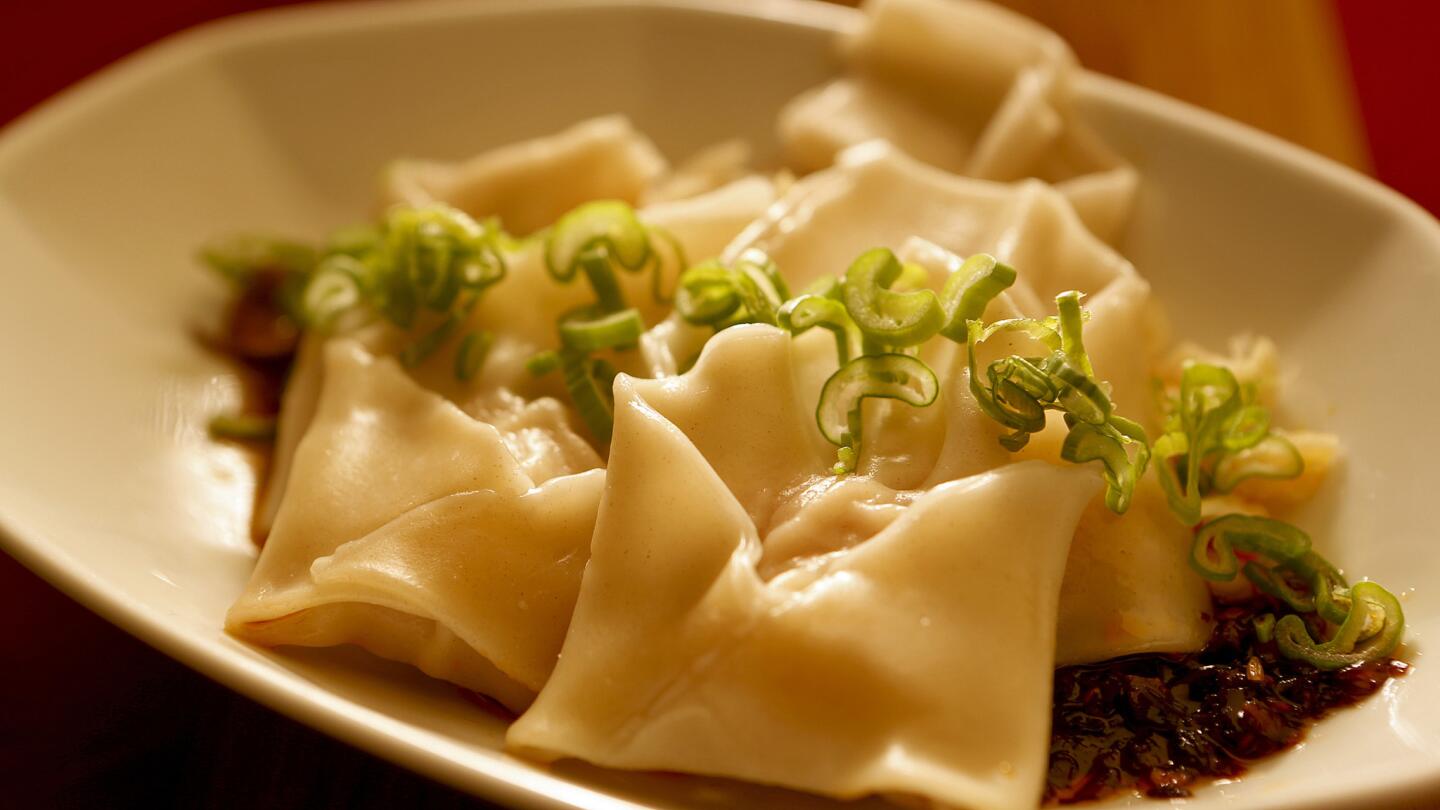 Making Sichuan wontons is more fun with friends.