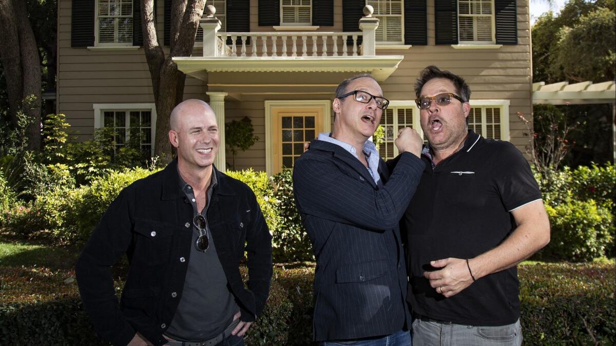 Producer Tripp Vinson, left, director Nicholas McCarthy and writer Jeff Buhler, the filmmakers behind "The Prodigy," photographed last month in Los Angeles in front of one of the homes used in the original "Halloween" film.