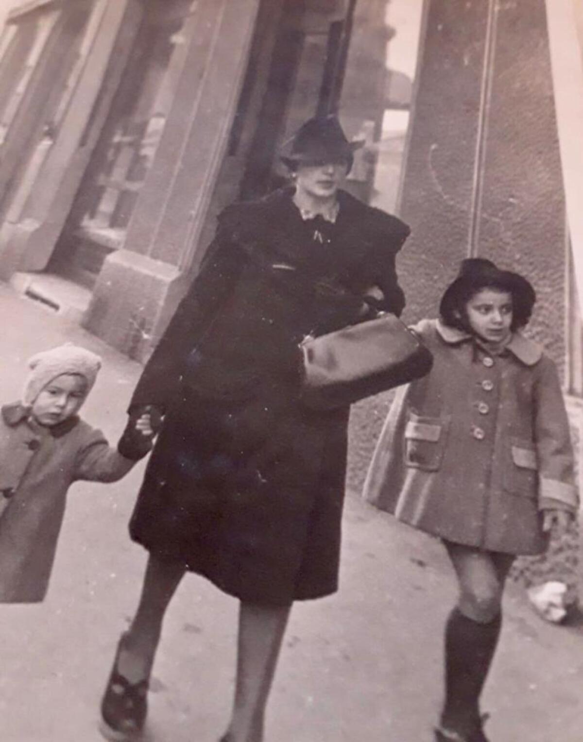 Elisa Andreoni and her brother Gianni Marchesi leaving Milan with their mother Amalia after the 1942 bombing.