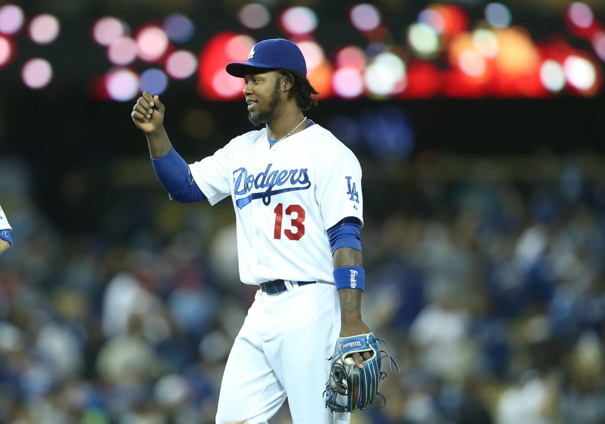 Dodgers shortstop Hanley Ramirez, shown on Wednesday, left Saturday night's game against Colorado after bruising his right thumb.