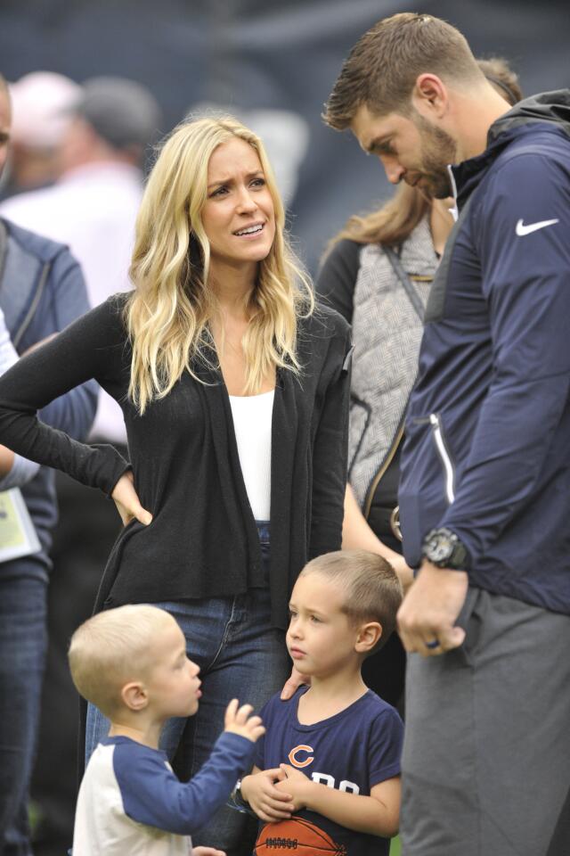 Jay Cutler talks with his wife Kristin Cavallari and his sons Jaxon and Camden before a Bears game at Soldier Field on Oct. 16, 2016.