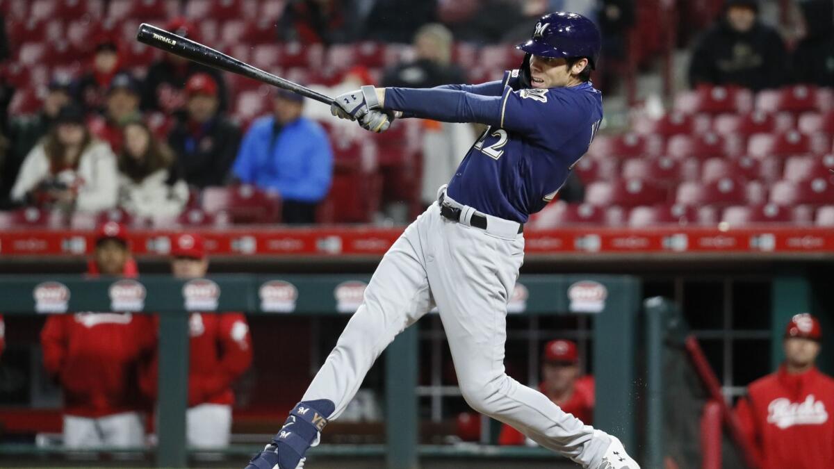 Milwaukee Brewers right fielder Christian Yelich hits a double during a game against the Cincinnati Reds on March 1.