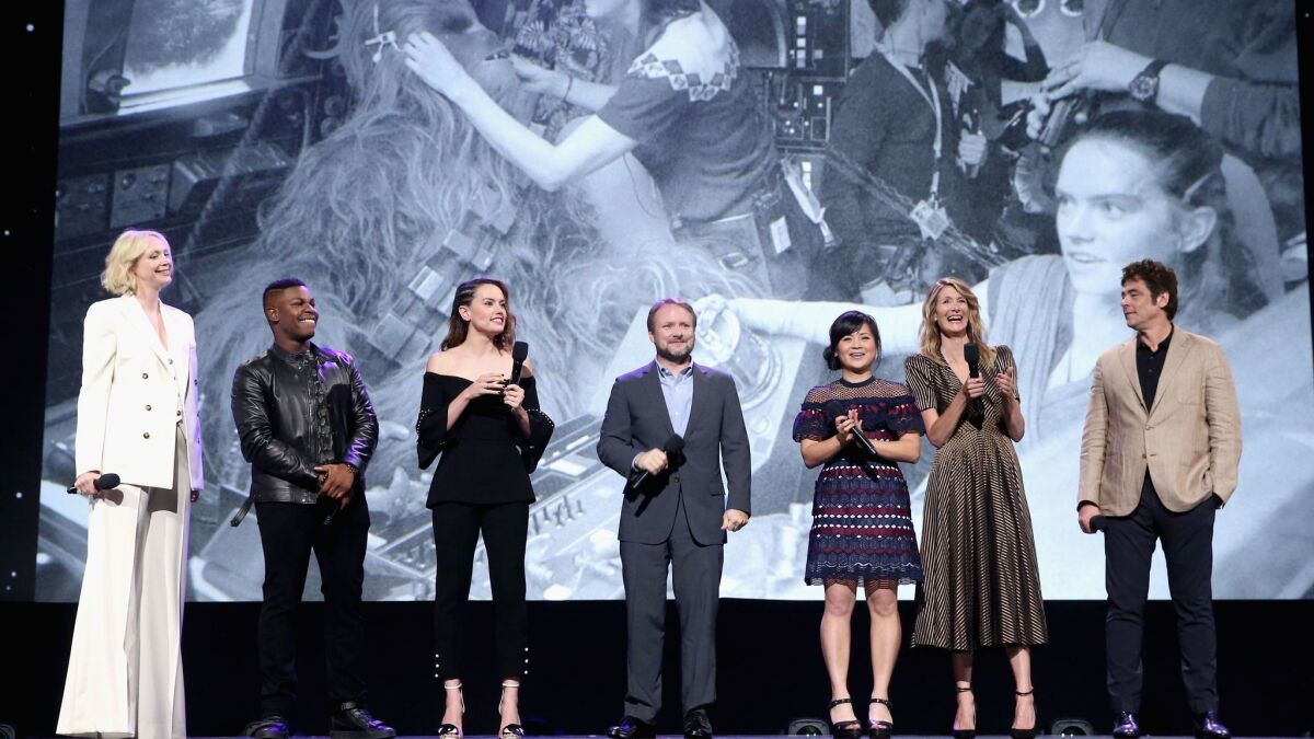 Gwendoline Christie, John Boyega, Daisy Ridley, Rian Johnson, Kelly Marie Tran, Laura Dern and Benicio del Toro of "Star Wars: The Last Jedi" on stage at Disney's D23 Expo in Anaheim.