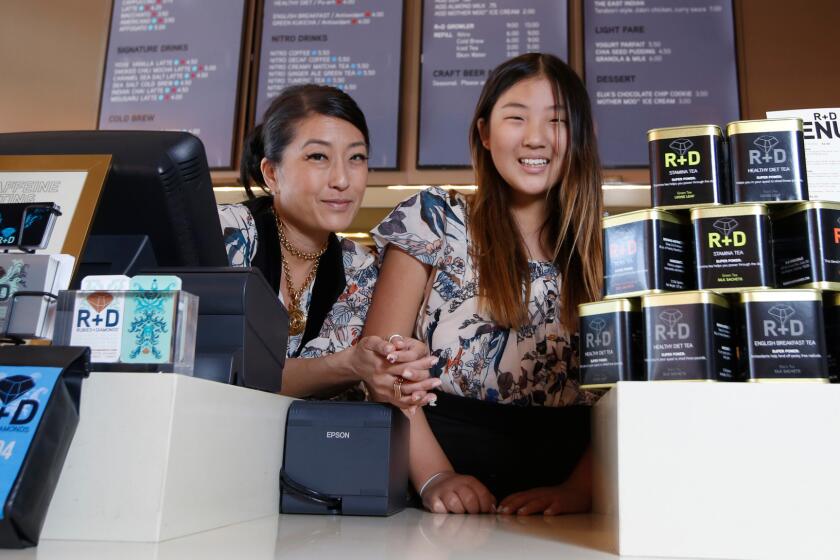 Owner Jean Shim, left, and her daughter Elia Min, at Rubies + Diamonds cafe in Hollywood. Elia makes the chocolate chip cookies they sell there.