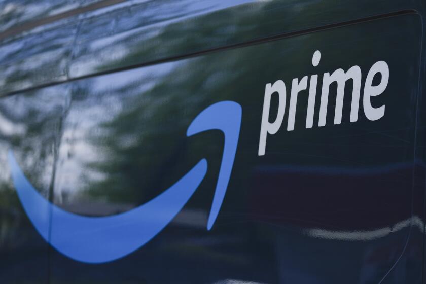 FILE - An Amazon Prime truck is seen on Friday, April 5, 2024, in Portland, Ore. Amazon will reports earnings on Tuesday, April 30, 2024. (AP Photo/Jenny Kane, File)