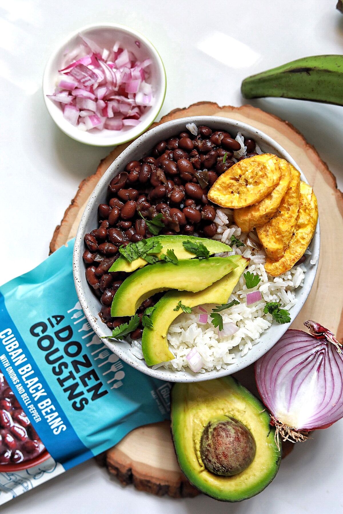 Beans with rice, plantains and avocado make a one-bowl meal.