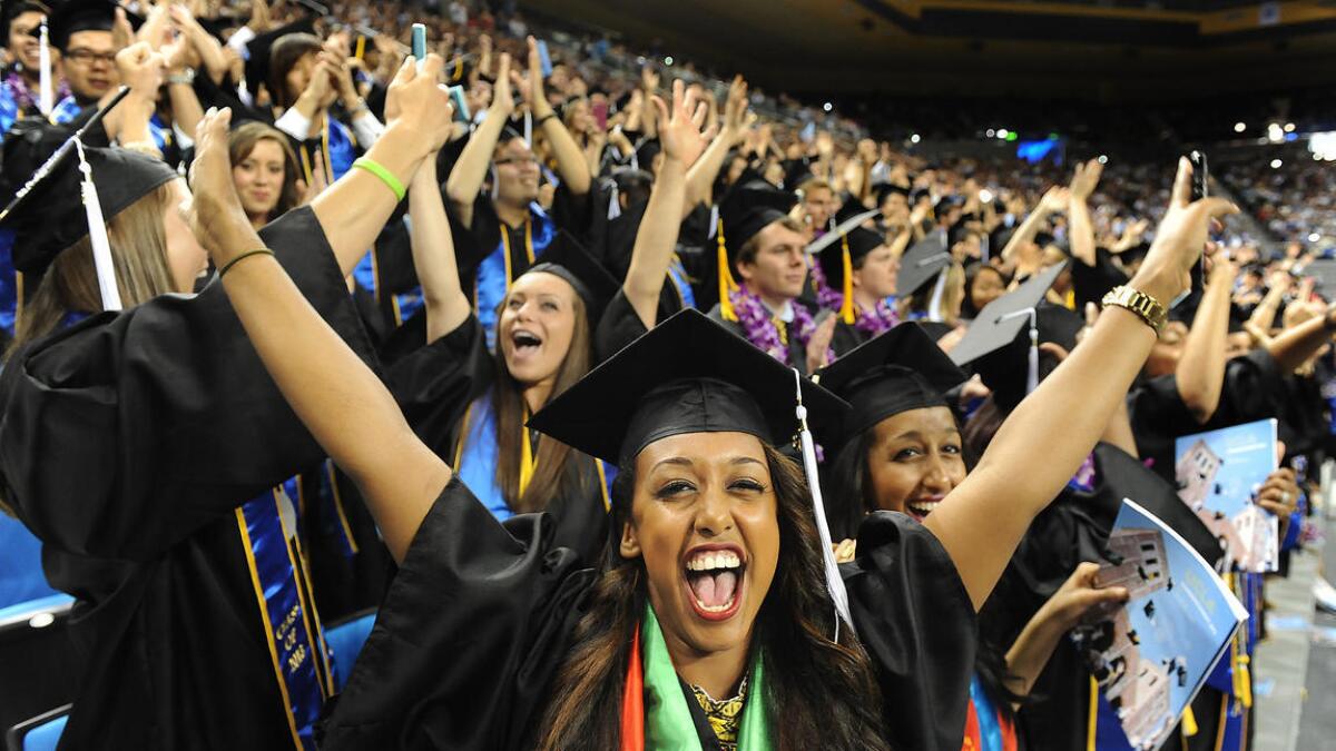 UCLA's commencement in 2013. A report from Burning Glass found that more employers are asking for college degrees for positions that previously didn't require them.