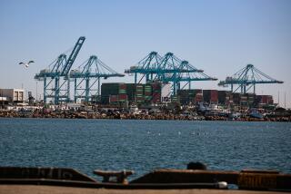 SAN PEDRO, CA - OCTOBER 13: The Port of Los Angeles is backed up with a growing number of incoming cargo ships waiting offshore as the port is set to begin operating around the clock on Wednesday, Oct. 13, 2021 in San Pedro, CA. (Jason Armond / Los Angeles Times)