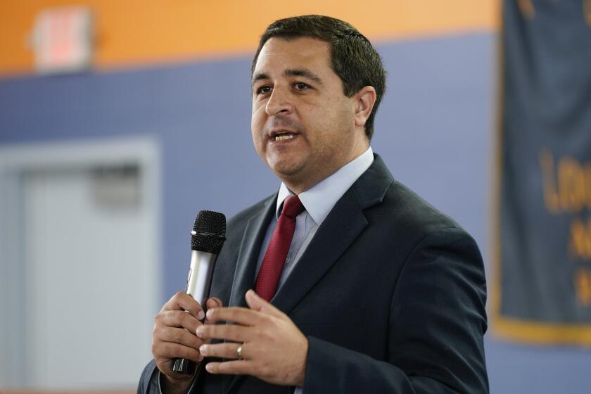 FILE - Wisconsin Attorney General Josh Kaul speaks at a campaign stop on Oct. 27, 2022, in Milwaukee. Kaul filed felony forgery charges against two attorneys and an aide who submitted paperwork falsely saying that former President Donald Trump had won the battleground state in 2020. (AP Photo/Morry Gash, File)
