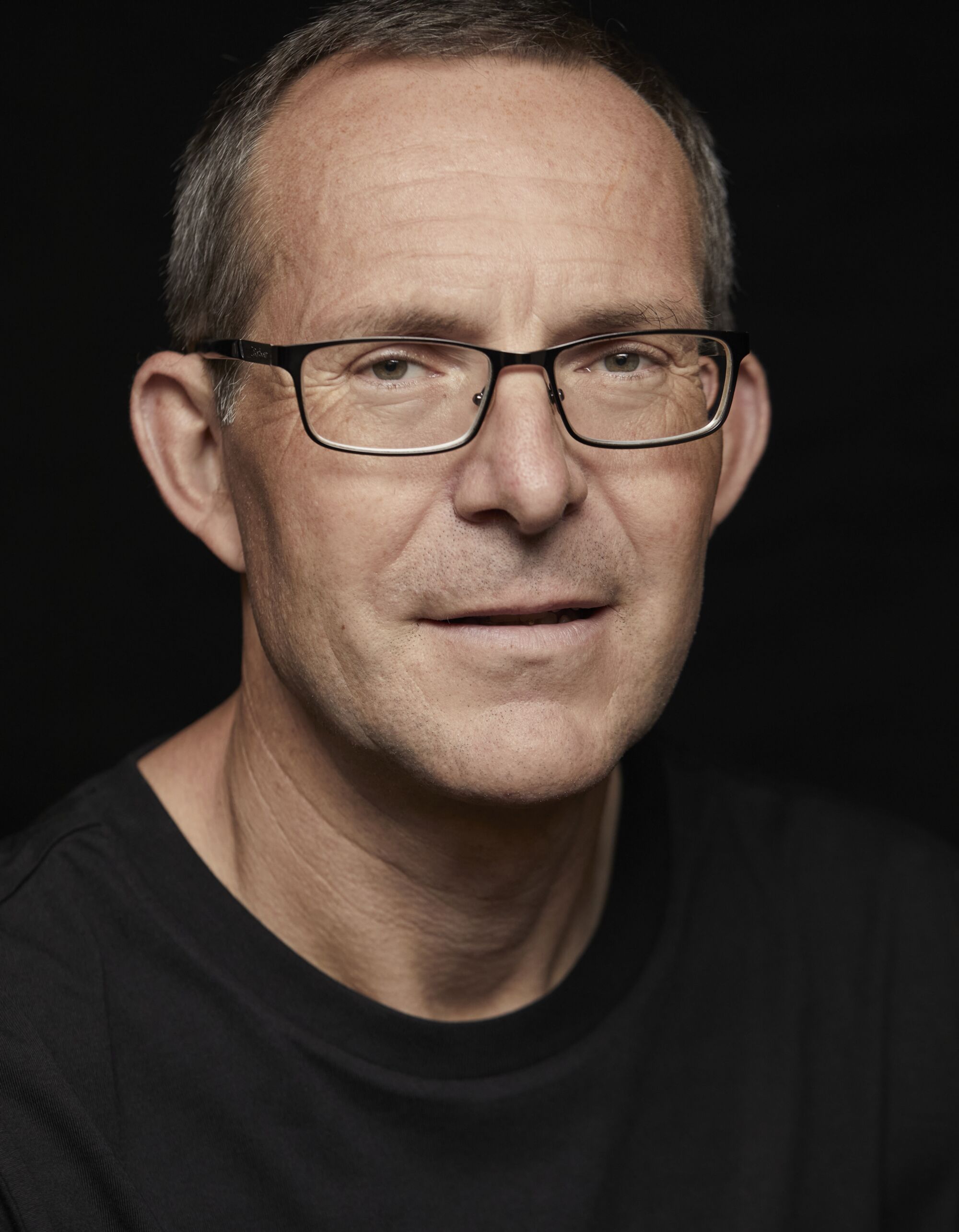 A portrait of a man who is a cave diver and an IT consultant