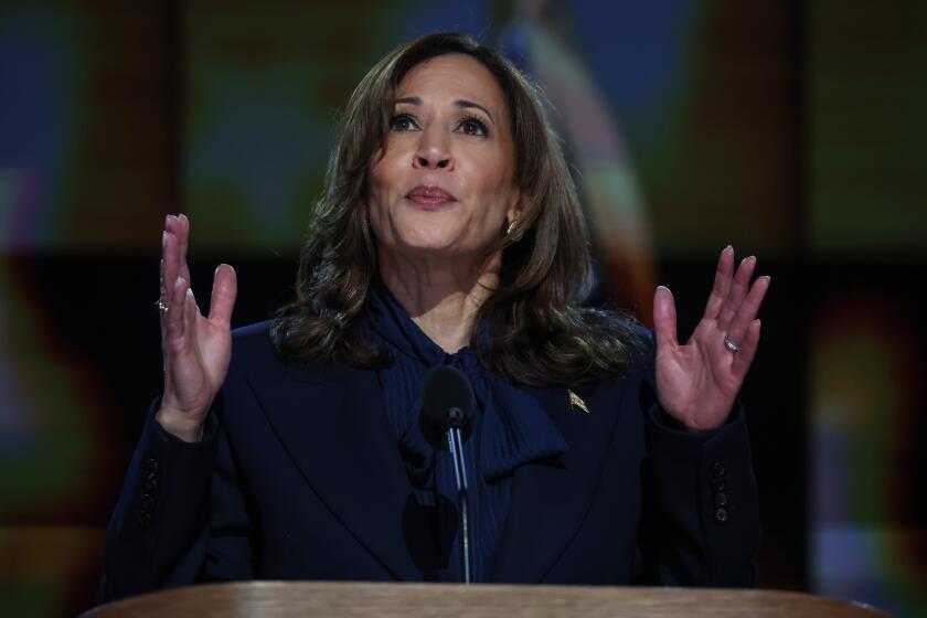 Chicago, Ill, Wednesday, August 21, 2024 - Vice President Kamala Harris delivers a speech as she accepts the party's nomination to be it's presidential candidate at the Democratic National Convention at the United Center. (Robert Gauthier/Los Angeles Times)