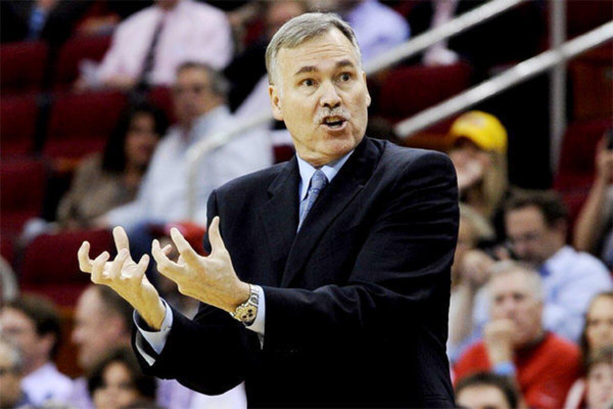 Lakers Coach Mike D'Antoni instructs his players during a 107-105 loss in Houston on Tuesday night.