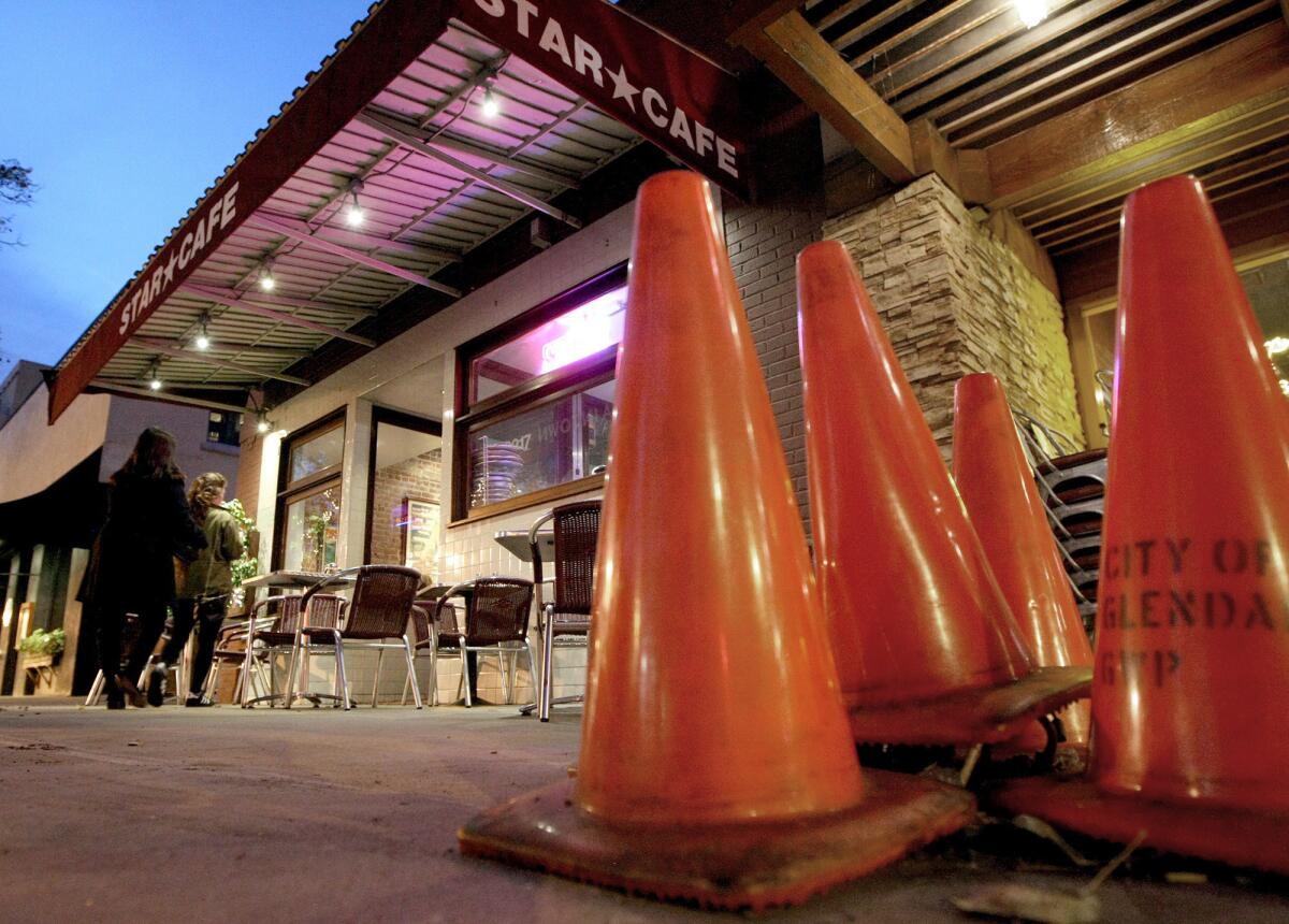 Safety cones cover an area in front of the Star Cafe in Montrose where a 65-year-old man crashed his car into the restaurant's patio on Monday. No one was injured, police said.