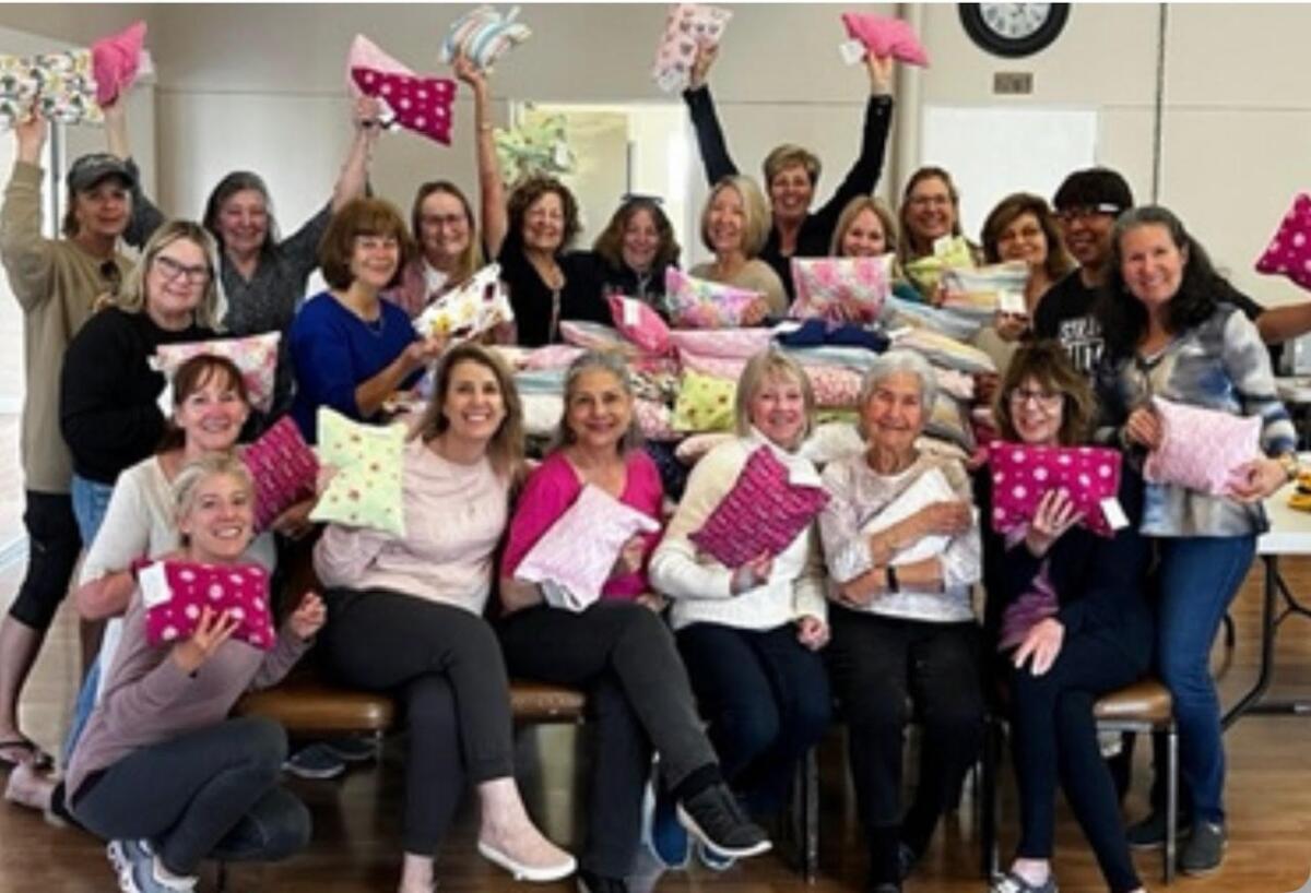 Woman’s Club of Carlsbad volunteers who worked on a previous pillow project.