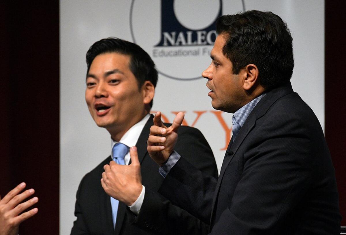 Robert Lee Ahn, left, and Assemblyman Jimmy Gomez sparred in a debate Thursday night ahead of the runoff for the 34th Congressional District seat.