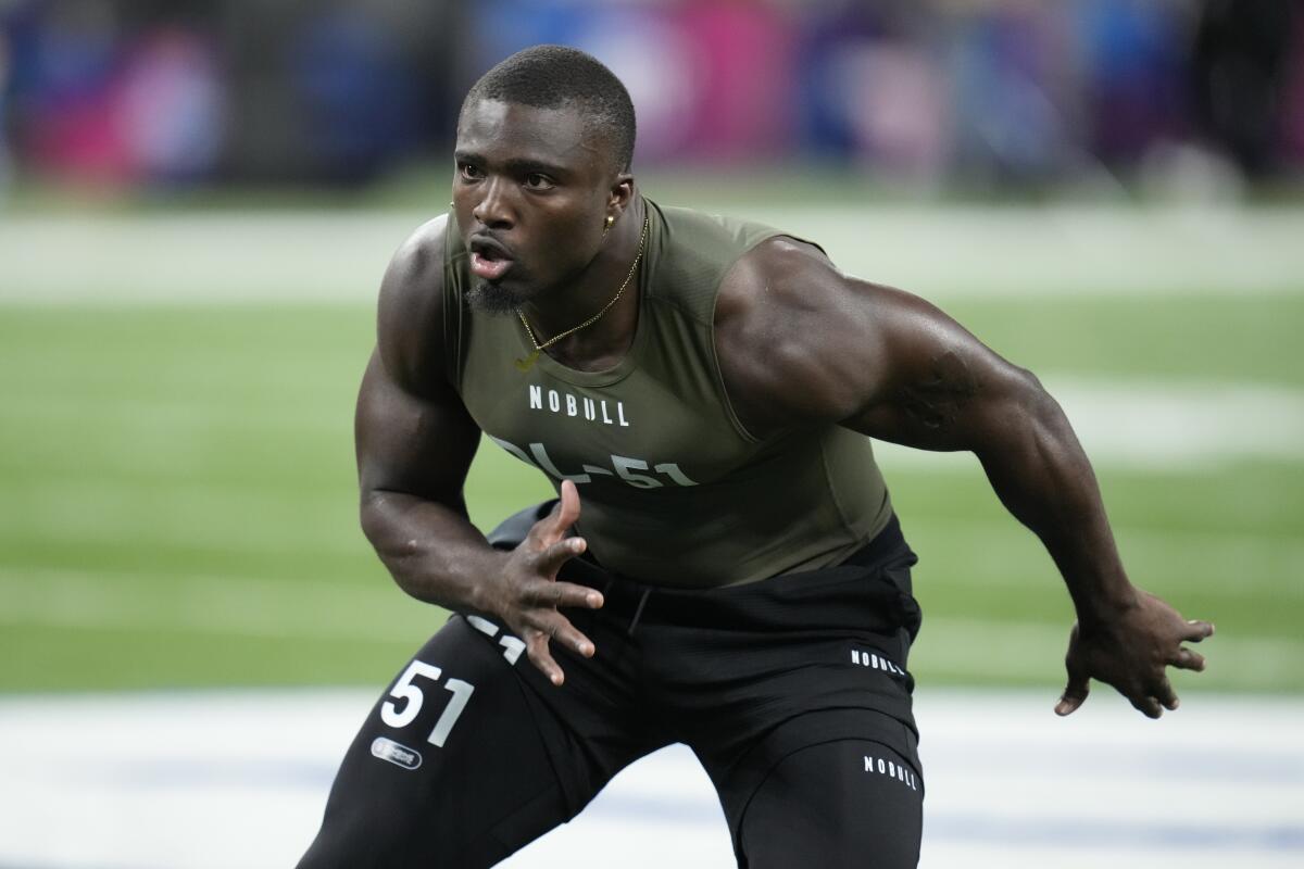 Tennessee defensive lineman Byron Young runs a drill at the NFL combine.