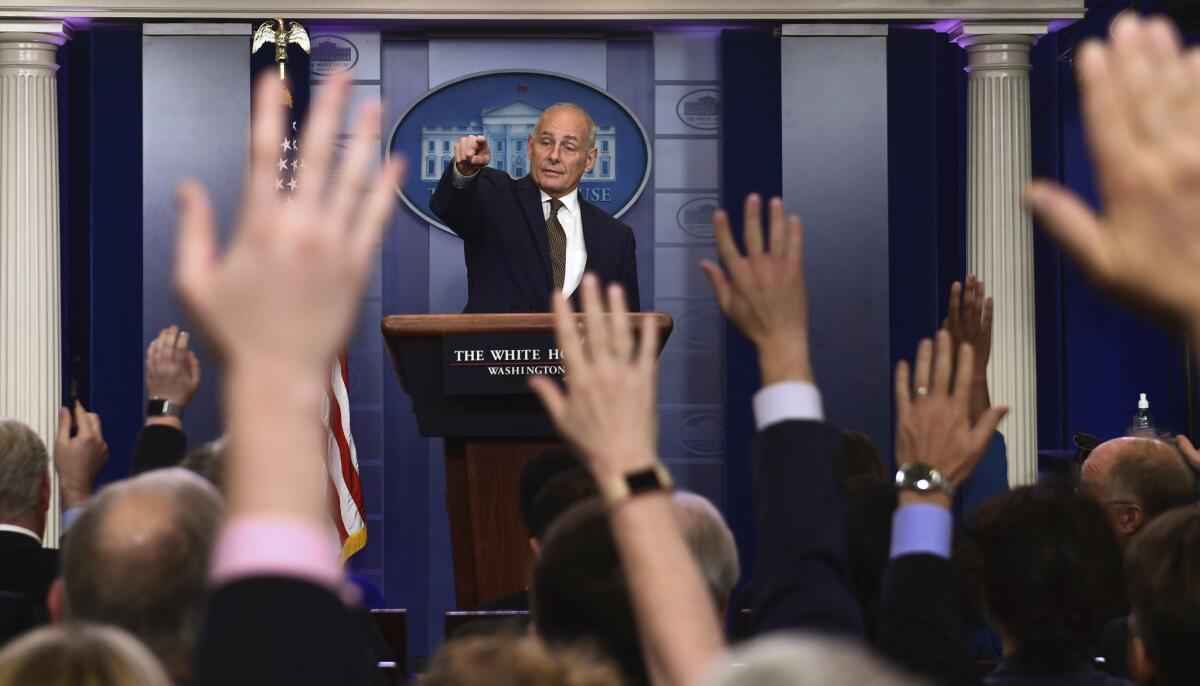 White House Chief of Staff John Kelly calls on a reporter during the daily briefing at the White House in Washington on Oct. 12.