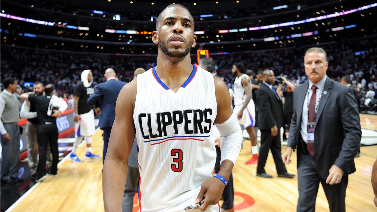 Chris Paul exits the court after the Clippers lost to the Utah Jazz on April 30 in Game 7 of a first-round series in the NBA Western Conference playoffs. It could end up being his last game as a Clipper.