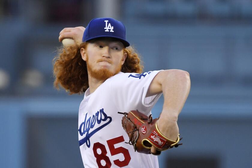 Los Angeles Dodgers starting pitcher Dustin May throws during the first inning of the team's baseball game against the San Diego Padres on Friday, Aug. 2, 2019, in Los Angeles. (AP Photo/Mark J. Terrill)