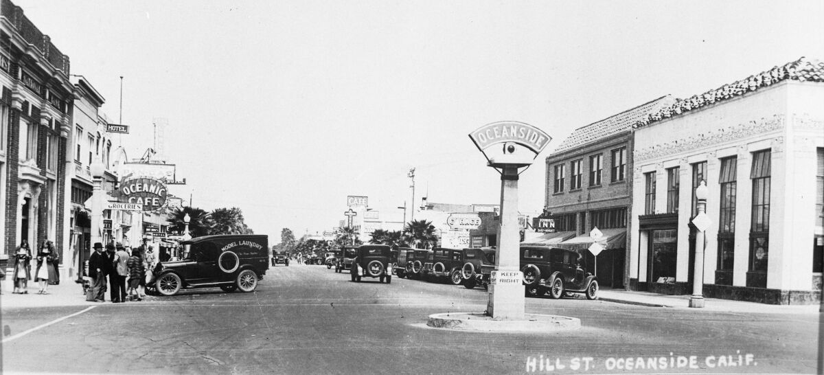 Oceanside's landmark sign in the early 1920s, looking north on Hill Street, now North Coast Highway, from Mission Avenue.