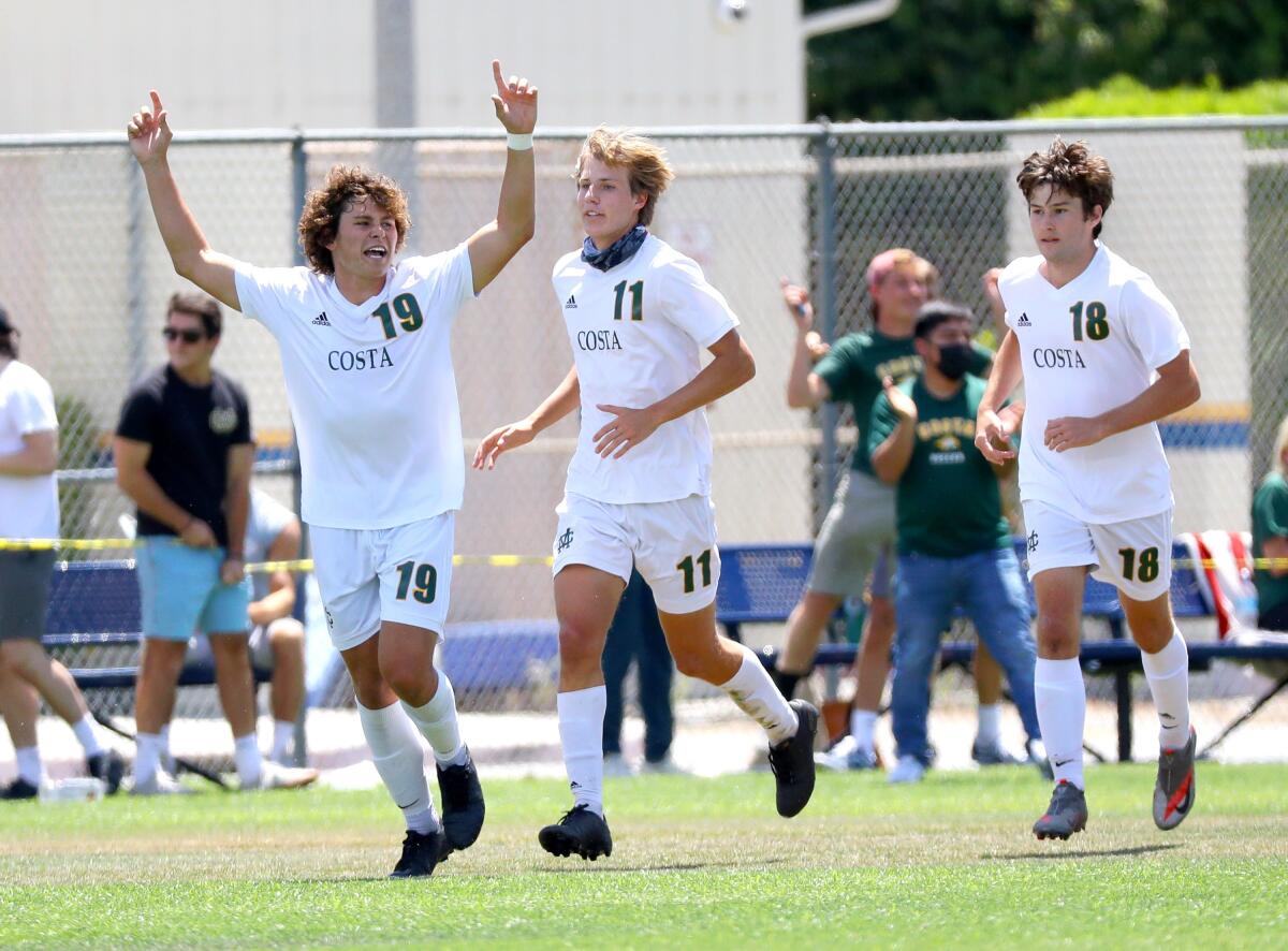 Mira Costa's Thomas Southey (19) celebrates with teammates after scoring against Birmingham on Saturday.