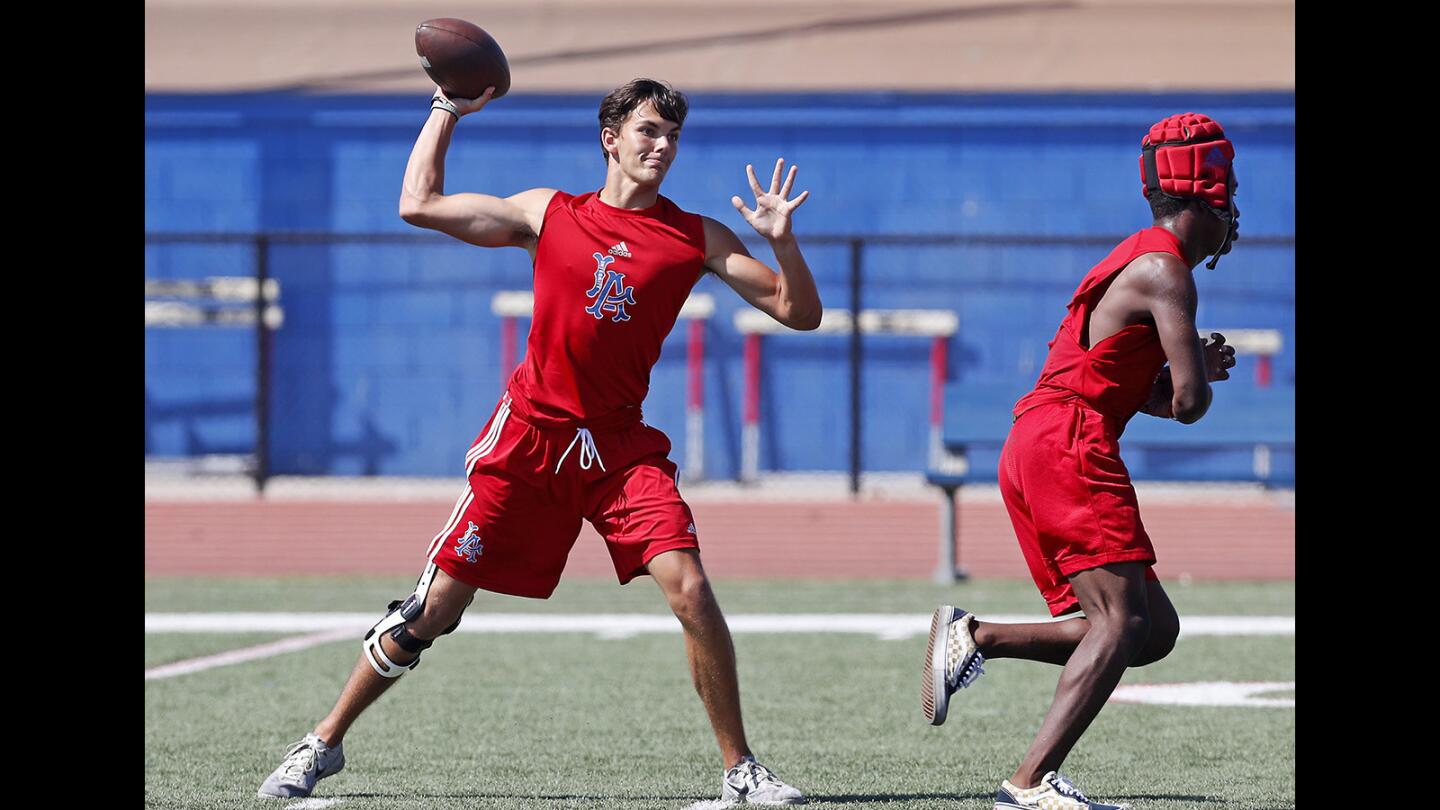 Los Alamitos High junior quarterback Cade McConnell throws the ball during practice in Los Alamitos on Wednesday, August 22.