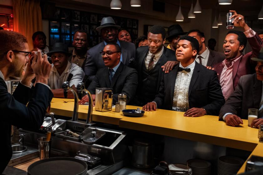 Aldis Hodge (third from right), Eli Goree (second from right) and Leslie Odom Jr. (far right) in a scene from "One Night in Miami." Credit: Patti Perret/ Amazon Prime Video