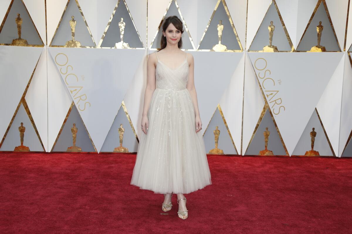 Felicity Jones, wearing Dior, unfortunately missed the mark. The plain-and-simple ballerina look might be perfect for the top of a tween girl's musical jewelry box, but on the Academy Awards red carpet it's a short spin to the worst-dressed list.