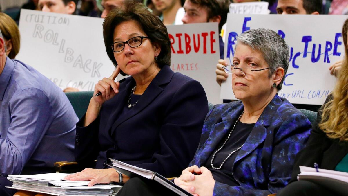 Monica Lozano, left, chair of the University of California Board of Regents, and UC President Janet Napolitano at a legislative hearing in the wake of a scathing audit on spending by Napolitano's office. (Rich Pedroncelli / Associated Press)