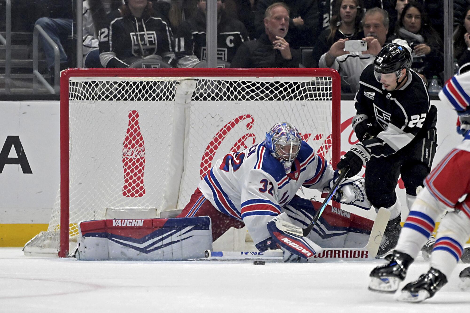 Kings left wing Kevin Fiala scores past New York Rangers goaltender Jonathan Quick during the first period Saturday night.