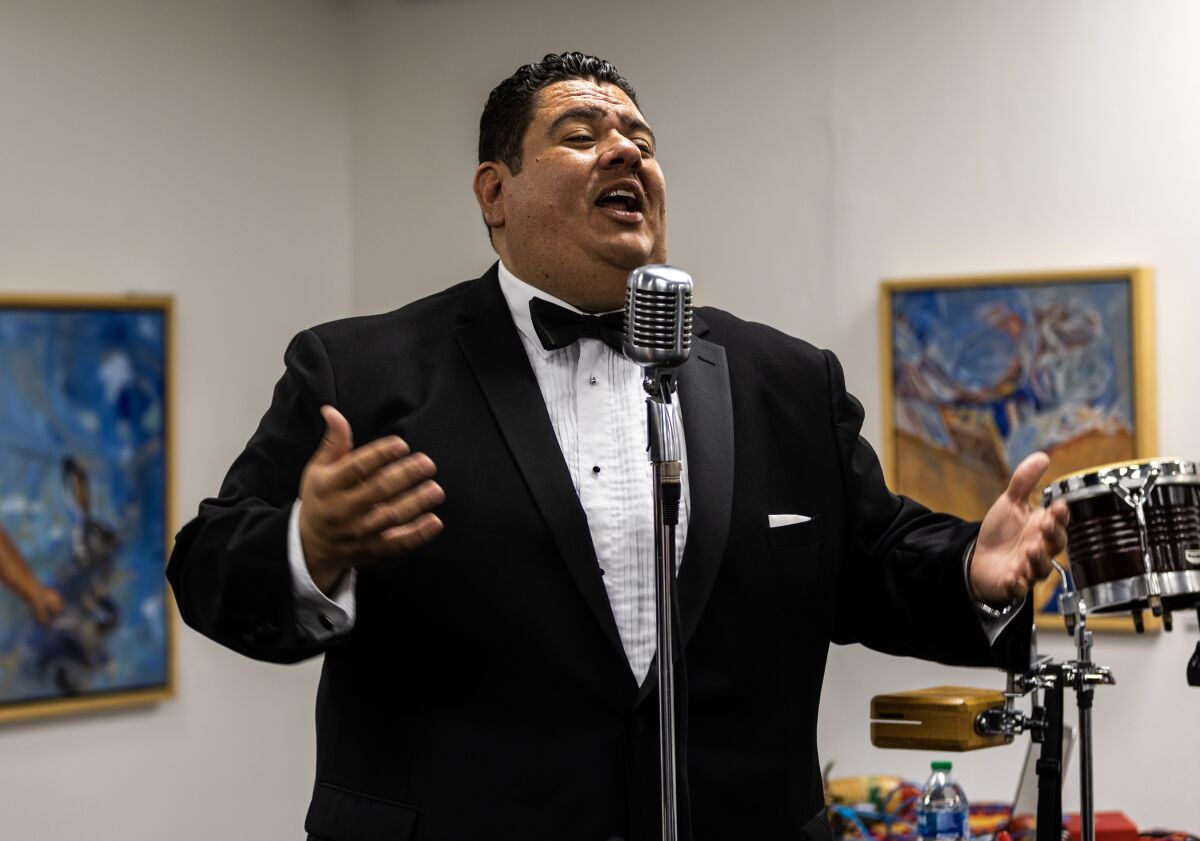 Julian Torres sings during a lineup announcement to promote the Levitt Pavilion Summer Concert Series in MacArthur Park 
