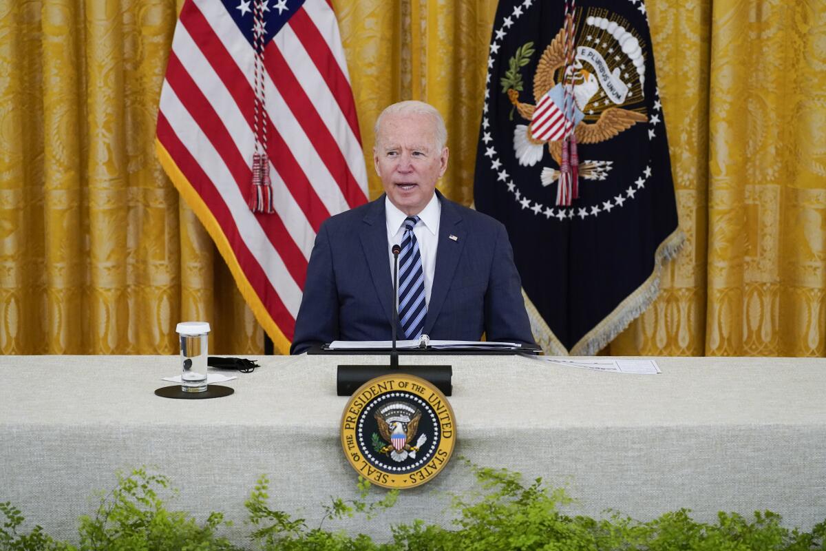 President Biden speaks  in the East Room of the White House 