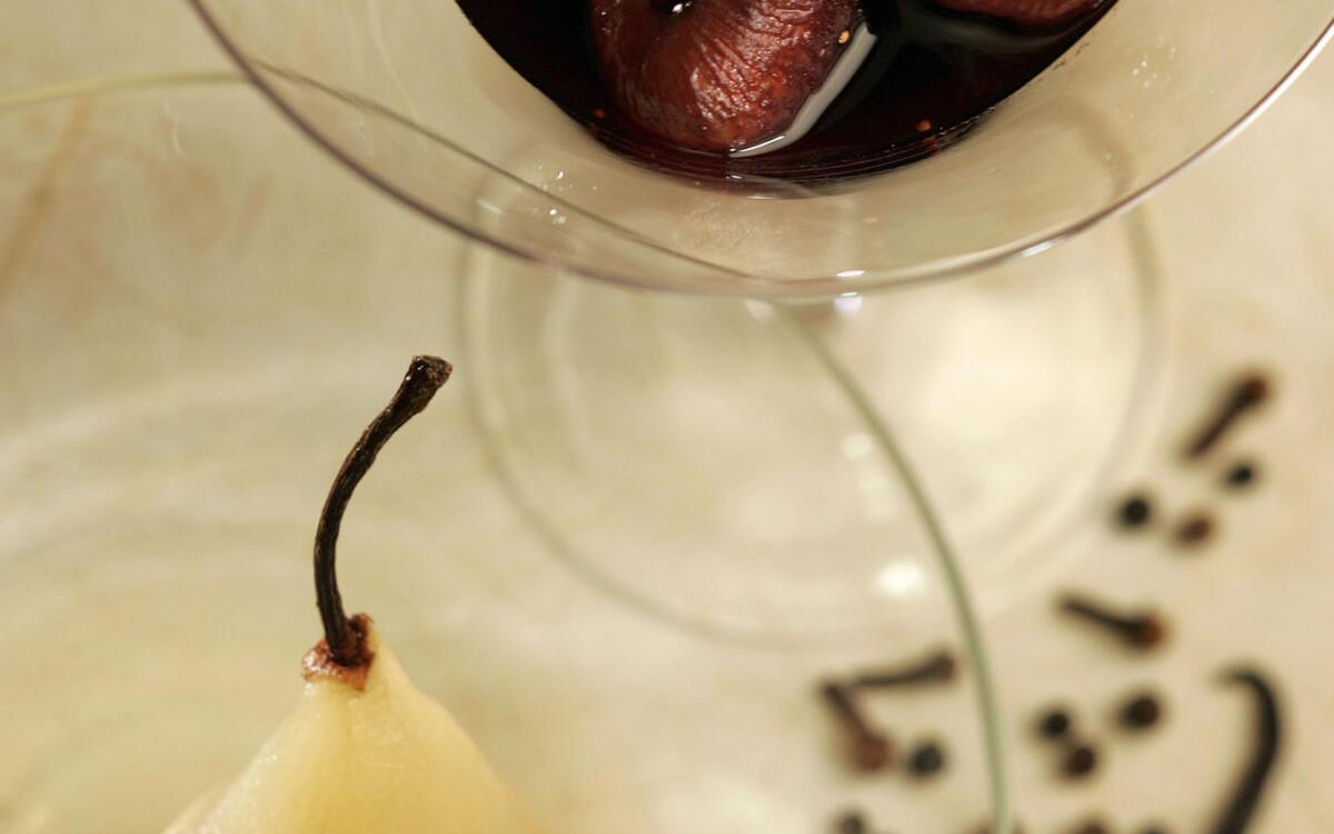 Poached pears with poached, spiced figs
