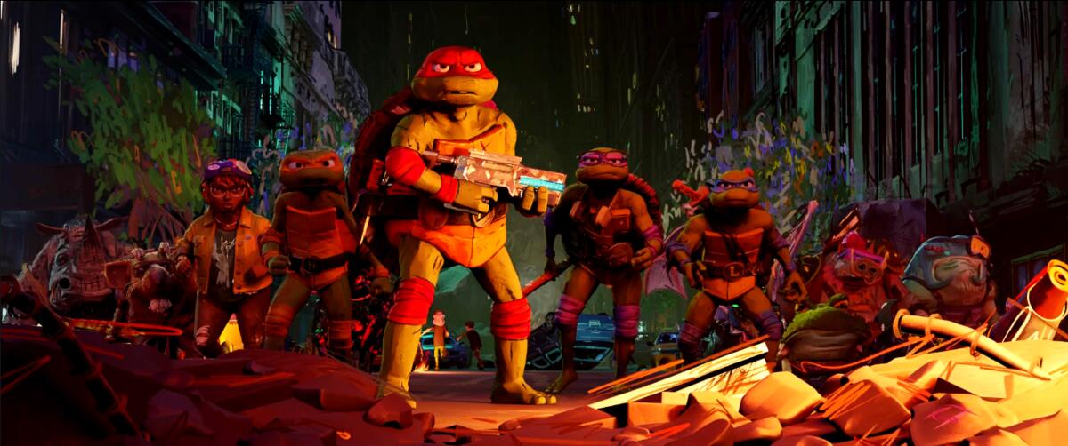 A Teenage Mutant Ninja Turtle stands holding a weapon with other Turtles behind him